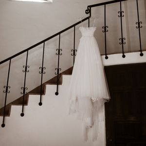 Slightly pink, french lace, strapless wedding gown